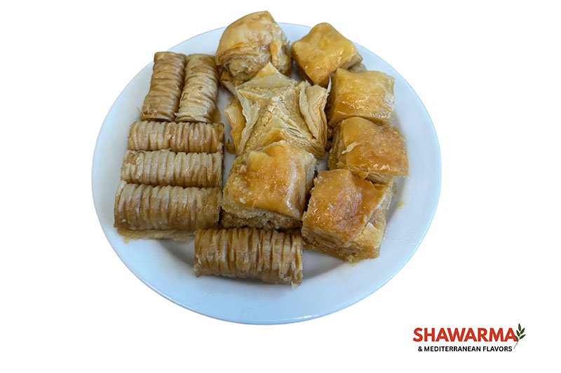 Baklava dessert with layers of filo pastry, nuts, and honey syrup – Shawarma & Mediterranean Flavors Edmonton.
