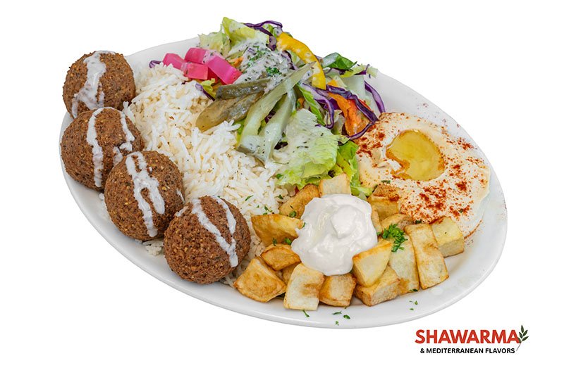 Falafel Plate with crispy falafel, hummus, salad, and pita – Shawarma & Mediterranean Flavors Edmonton.
